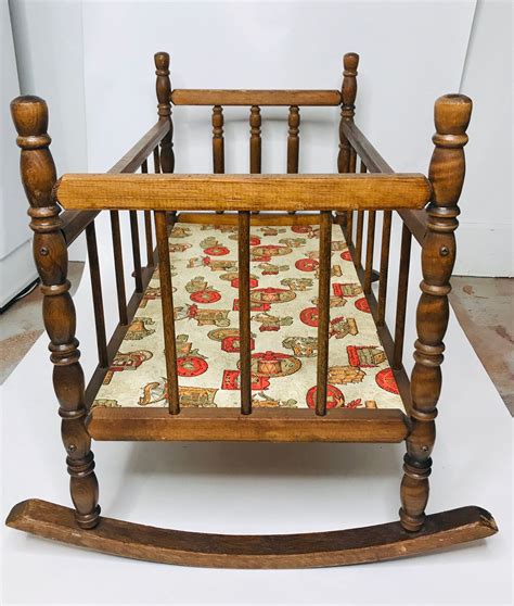 vintage rocking doll bed